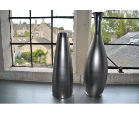 Pair of ceramic silver metallised vases 34 cm and 45 cm high together with a glass cube candlestick 19.5 cm high, from Room 1