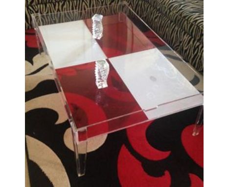 Perspex coffee table, rectangular, in "butler tray" style with fixed edge uprights, with red and white pattern, 119 cm long, 