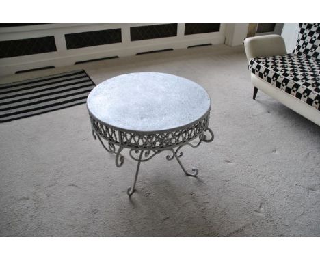 Small circular off-white occasional metal table with decorated pelmet 60 cm diameter, 44 cm high, from the Lounge 