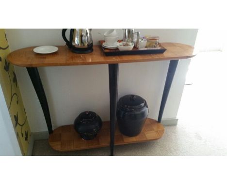 Console table, Art Deco style raised on three supports, undertier, ovoid top and lower tier, wood throughout, 134 cm long, 92