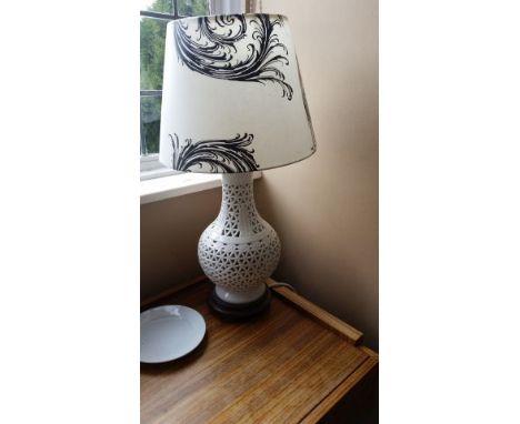 Table lamp, white perforated ceramic base with black and white rococo shade. 58cm high overall.  PAT tested Oct 2015 - from G