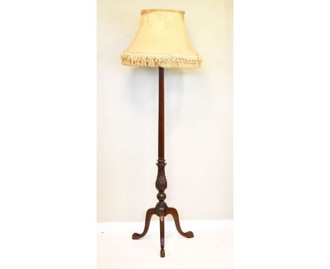 Reproduction mahogany finish standard lamp with shade standing on a tripod base   Condition: 