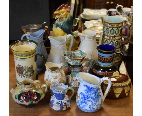 Quantity of various decorative ceramic jugs etc   Condition: 