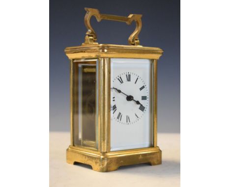 French brass cased carriage clock, the white enamel dial with Roman numerals   Condition: 