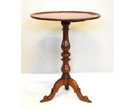 Victorian mahogany dish top wine table standing on a turned pillar and tripod base   Condition: 