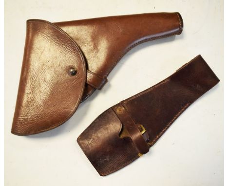 Vintage leather gun holster and a similar compass case   Condition: 
