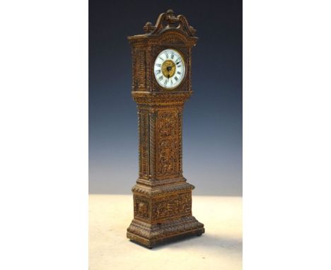 Late 19th Century cast iron cased American mantel clock in the form of a longcase clock   Condition: 