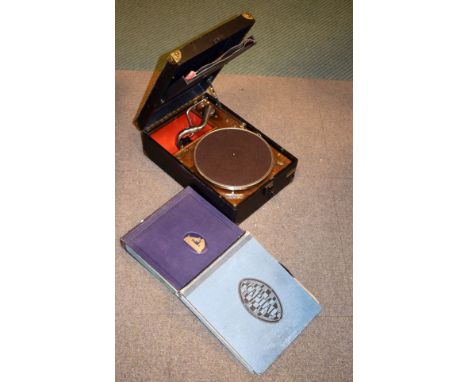 Vintage H.M.V. portable windup gramophone and a quantity of 78rpm records   Condition: 