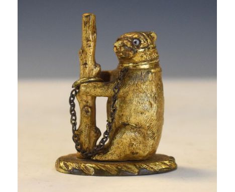 Late 19th/early 20th Century gilt brass vesta case/inkwell formed as a bear tethered to a staff   Condition: 