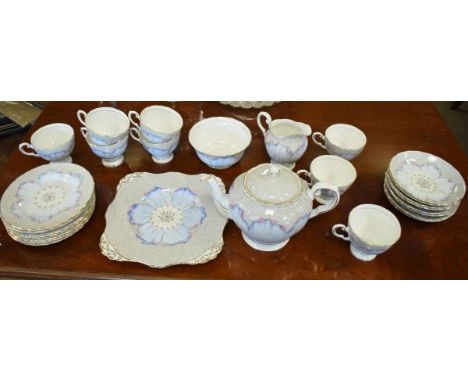 1930's period Tuscan eight person tea service having pale blue, pink and grey stylised decoration   Condition: 