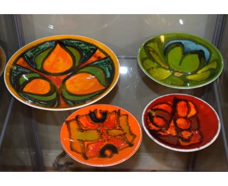 Four small Poole Pottery Delphis range dishes, each having typical abstract decoration   Condition: 