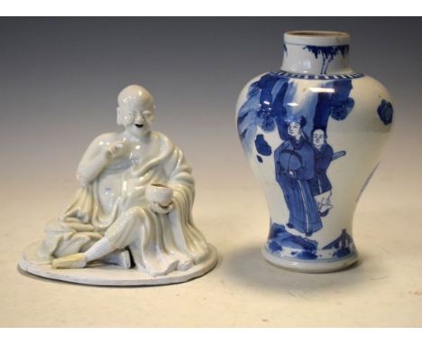 Chinese blue and white painted baluster shaped vase decorated in the Kangxi style with figures in a landscape together with a