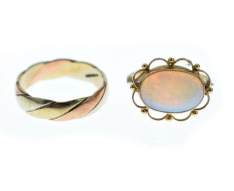 Opal set dress ring, the shank stamped 9ct, and a 9ct tri-coloured gold wedding band   Condition: 