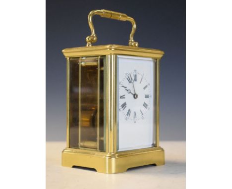 French brass cased carriage clock, the white enamel dial with Roman numerals   Condition: 