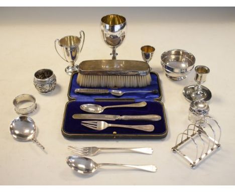 Various silver and white metal items including; toast rack, candlestick, sugar bowl, trophy cup etc together with a silver pl