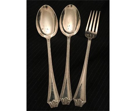 Two silver spoons and a fork hallmarked Birningham 1938 and 1940 (119g)