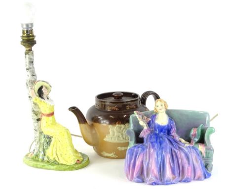 A collection of items, to include a continental porcelain lamp base decorated with a figure wearing yellow dress beside a tre