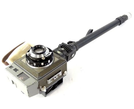 A Japanese camera or cine camera, with Seikosha-s lens, sold with Cullmann handle.