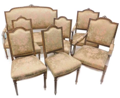 A continental mahogany salon suite, comprising sofa, a pair of armchairs and four side chairs, each carved with ribbons and w