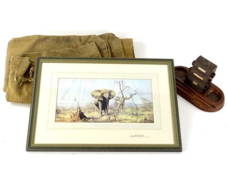 An Art Deco desk calendar, on wooden stand, with articulated centre, showing various dates, 21cm W, After David Shepherd elep