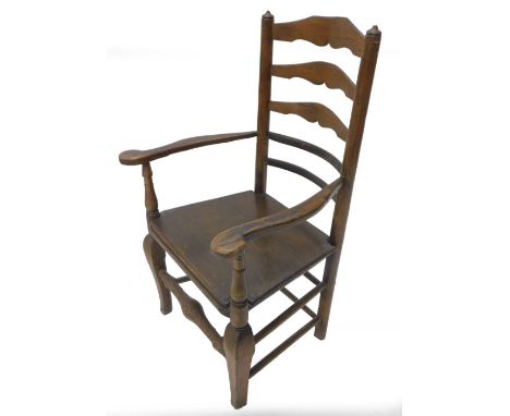 A 19thC ash ladder back chair, with a solid seat on shaped legs with turned stretcher.