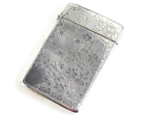 An Edwardian silver card case, with engine turned and bright cut decoration of flowers etc., Birmingham 1903, 1¾oz.