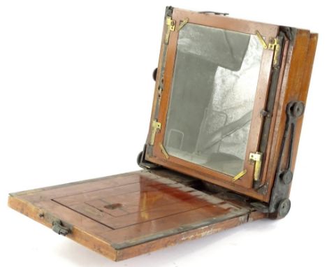 A mahogany and brass plate camera, stamped J Lancaster &amp; Son of Birmingham, (incomplete and AF).