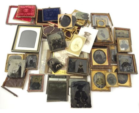 A large quantity of Victorian and later ambrotype and other photographs, to include a regimental posed setting, Second World 