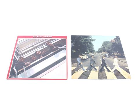 Two The Beatles vinyl LP albums. 'The Beatles/1962-1966', known as the Red album and 'Beatles Abbey Road' (1969) PCS 7088   C
