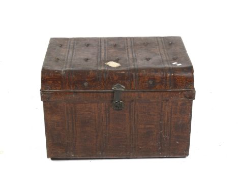 A tin travelling trunk. Of riveted construction with a blue painted interior. L80cm x D61cm x H56cm