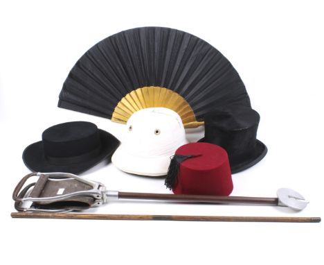 A collection of four various vintage hats, a shooting stick etc. Including a Fez, a Christy's silk top hat and a Herbert John