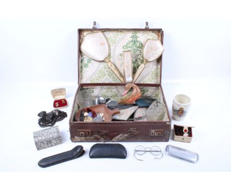 A vintage suitcase of mixed collectables.  Including a cut throat razor, glasses, cufflinks, jewellery box etc H11cm 