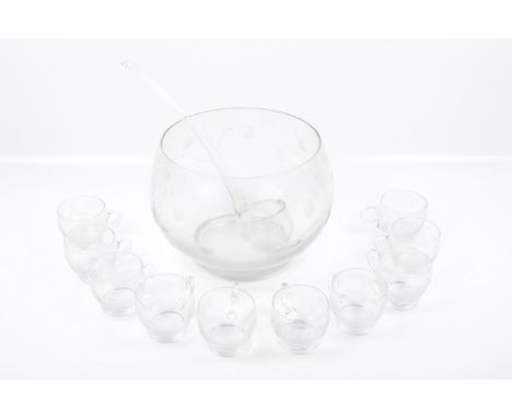 A large glass punch bowl with ladle and set of eleven glasses. All engraved with berries and vines, bowl. H20cm