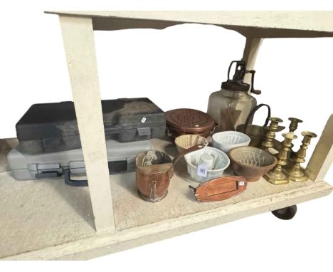 Kitchenalia to include four jelly moulds, butter churn, brass and copper and two level kits.