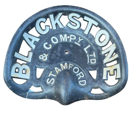 Cast metal tractor seat advertising Blackstone and Company Ltd Stamford.