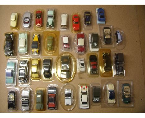 34 cased Solido and Corgi collectors vehicles 