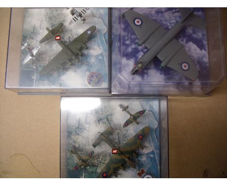 Three boxed Corgi aeroplane sets in display cases including B-17 Sally B box set, a English Electric Canberra B2/6 and a Batt