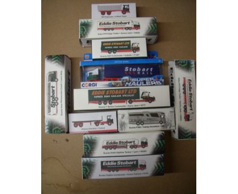 Collection of boxed Corgi and Atlas Editions Eddy Stobart vehicles including flat bed, Scania coaches, curtain siders etc 