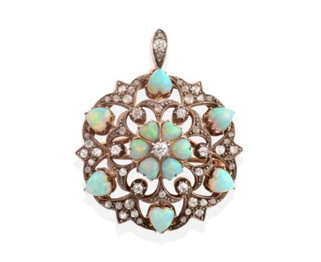 An Opal and Diamond Brooch/Pendant, an old cut diamond within a border of heart cabochon opals, to an openwork scroll frame s