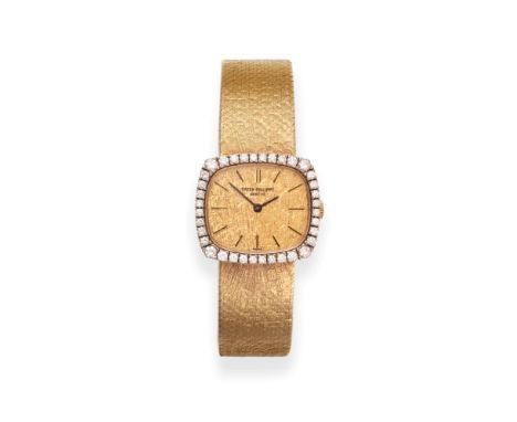 A Lady's 18ct Gold Diamond Set Wristwatch, signed Patek Philippe, Geneve, ref:4197-1, circa 1972, (calibre 16-250), lever mov