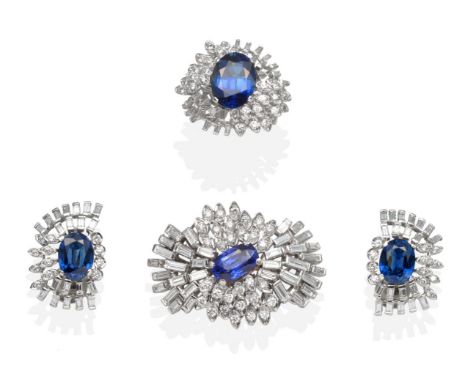 An 18 Carat White Gold Sapphire and Diamond Suite; Comprising a Brooch, a Pair of Clip Earrings and a Ring, each with an oval