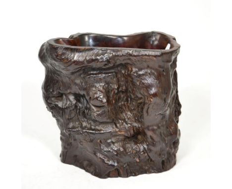 A Chinese Rootwood Scroll/Brush Pot (Bitong), Qing Dynasty, of naturalistic trunk form, 19.5cm high