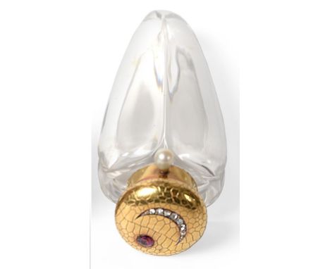 A French Gold Mounted Glass Scent Bottle, of fluted heart shape, the hinged cover set with a crescent of diamond chips and a 