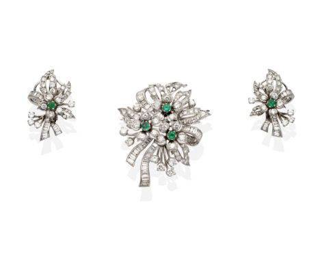 An Emerald and Diamond Brooch and Earrings Suite, the brooch formed of three flower heads, each with a central round cut emer