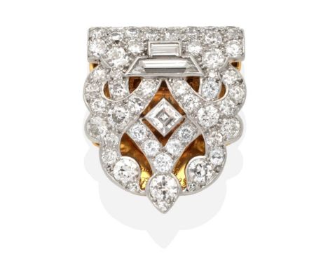 An Art Deco Diamond Clip Brooch, signed 'Cartier', a pierced clip set throughout with old cut and step cut diamonds, total es
