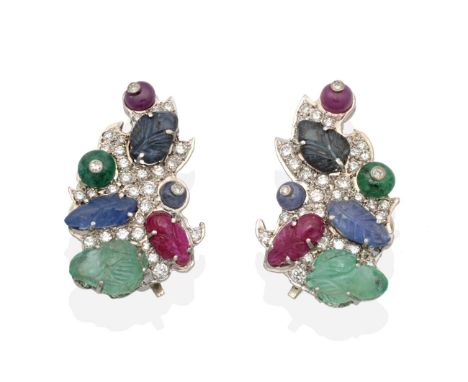 A Pair of 18 Carat White Gold Multi-Gemstone Clip Earrings, set with carved emeralds, sapphires and rubies to diamond frames,