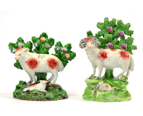 A Salt Pearlware Figure of a Ram, circa 1910, a lamb at its feet, on a mound base with bocage, marked SALT, 16.5cm high; and 