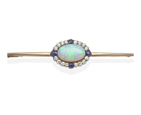 A Black Opal, Diamond and Sapphire Bar Brooch, an oval cabochon black opal, in a claw setting, within a border of old cut dia