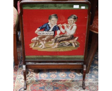 A SMALL QUEEN ANNE STYLE MAHOGANY CHEVAL FIRE SCREEN, with tapestry panel depicting two boys playing music on a bench. (1) 