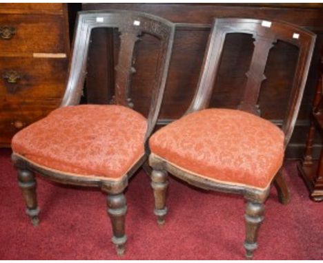 A SET OF FOUR VICTORIAN MAHOGANY SPOON BACK DINING CHAIRS; together with another similar set of five ditto. (9) 